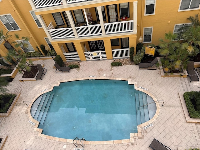 pool featuring a patio area