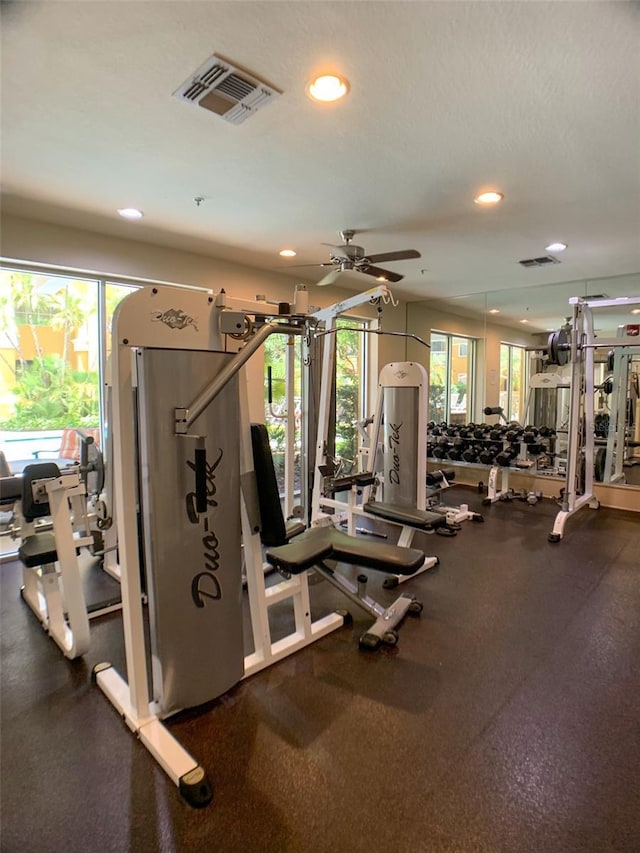 exercise room with visible vents, a ceiling fan, and recessed lighting