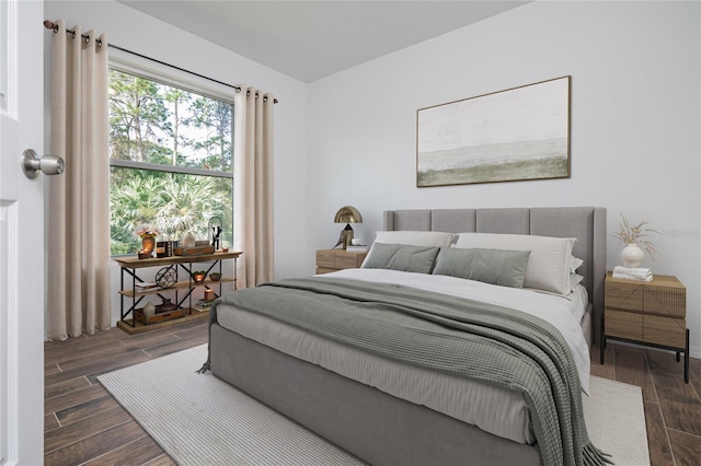 bedroom with wood finished floors