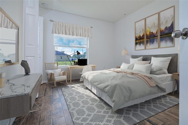 bedroom featuring dark wood-style floors