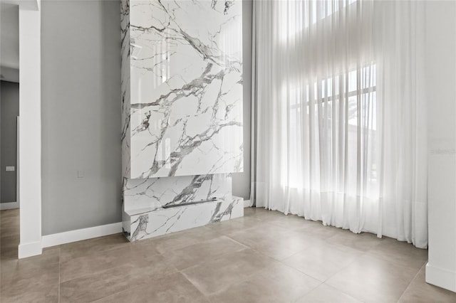 interior space featuring baseboards
