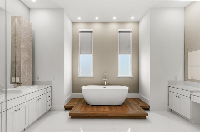 full bath with tile patterned flooring, two vanities, and a sink