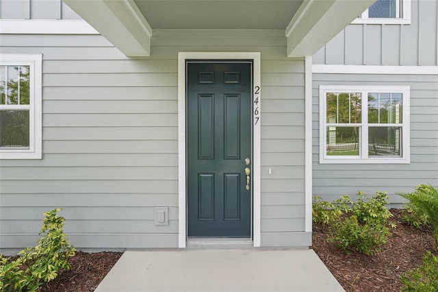 2467 Zuni Rd, Saint Cloud, FL 34771 - view of exterior entry with board and batten siding