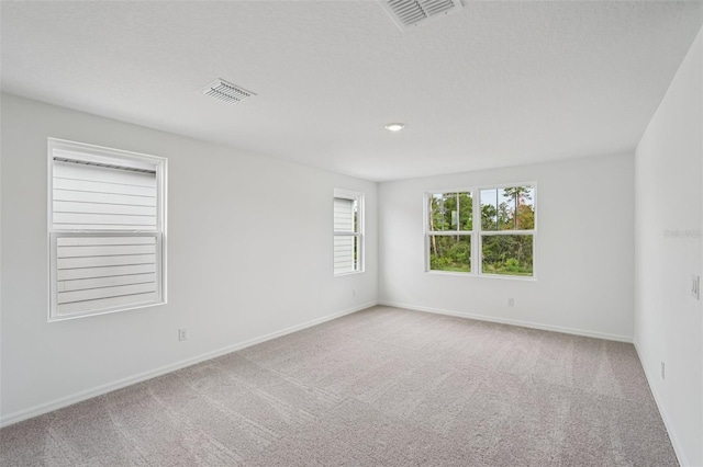2467 Zuni Rd, Saint Cloud, FL 34771 - unfurnished room featuring carpet floors and baseboards