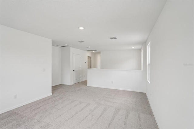 2467 Zuni Rd, Saint Cloud, FL 34771 - empty room with light colored carpet, recessed lighting, and baseboards