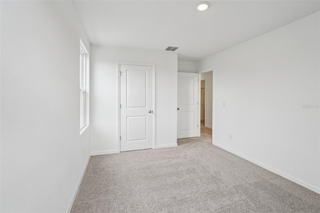 2467 Zuni Rd, Saint Cloud, FL 34771 - unfurnished bedroom with carpet and baseboards