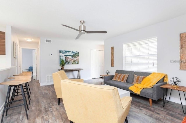 631 Trailwood Dr, Altamonte Springs, FL 32714 - living room with visible vents, a ceiling fan, baseboards, and wood finished floors