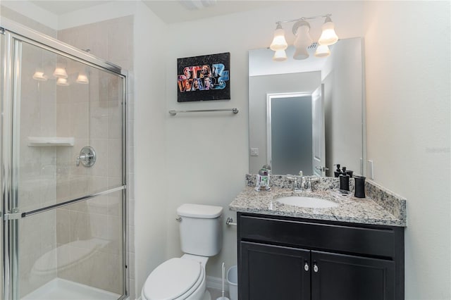 1820 Summer Dr, Davenport, FL 33897 - full bathroom with vanity, a shower stall, and toilet