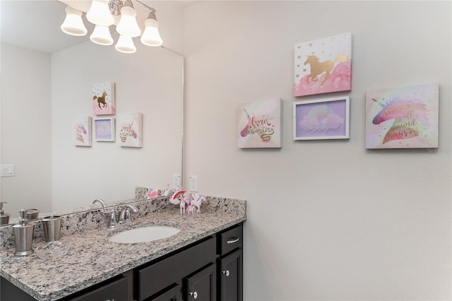 1820 Summer Dr, Davenport, FL 33897 - bathroom featuring vanity and a chandelier