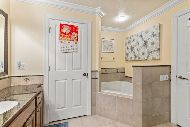 7630 Heritage Crossing Way Unit 302, Reunion, FL 34747 - full bath with vanity, a garden tub, tile patterned floors, a textured ceiling, and crown molding