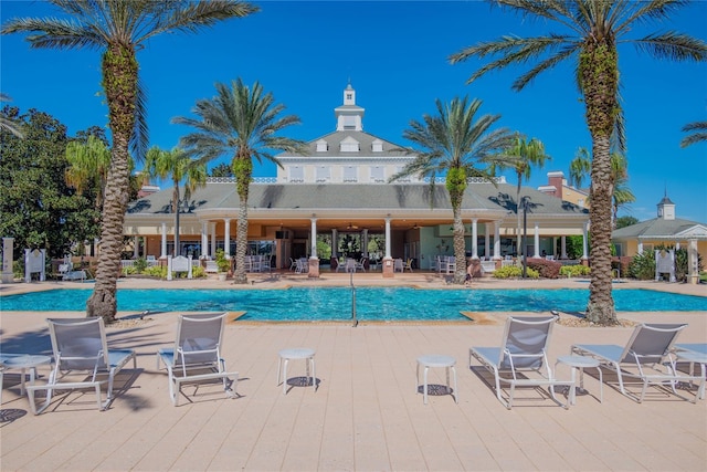 7630 Heritage Crossing Way Unit 302, Reunion, FL 34747 - community pool with a patio