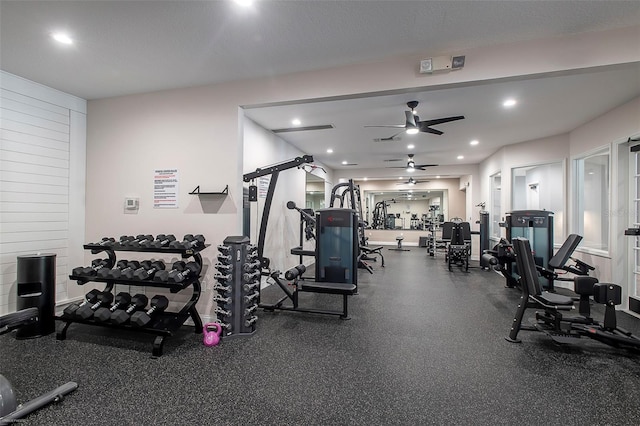 gym featuring a ceiling fan and recessed lighting