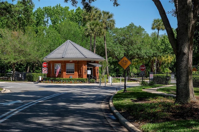 view of community featuring fence