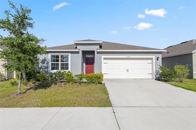 ranch-style house with a front lawn, an attached garage, concrete driveway, and stucco siding