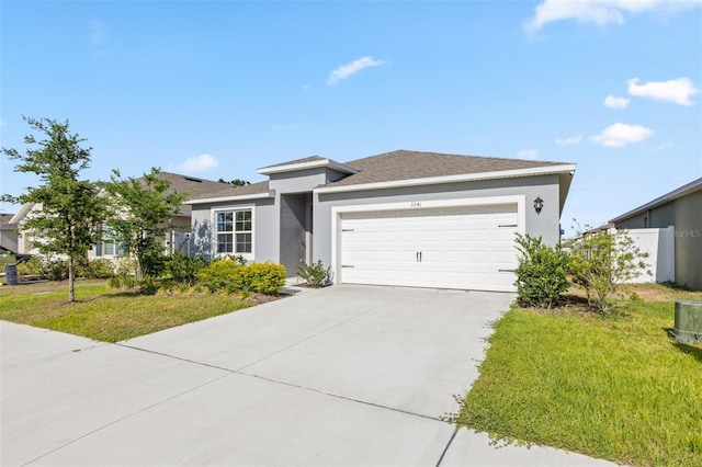 ranch-style home with a garage, stucco siding, driveway, and a front lawn