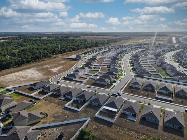 bird's eye view with a view of trees and a residential view