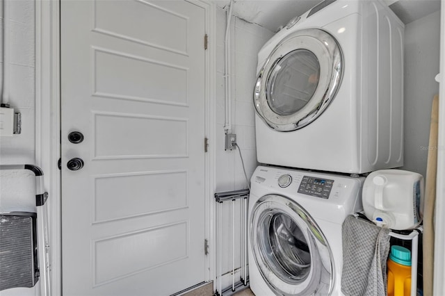 440 E Crystal Lake St, Orlando, FL 32806 - clothes washing area with laundry area and stacked washer / dryer