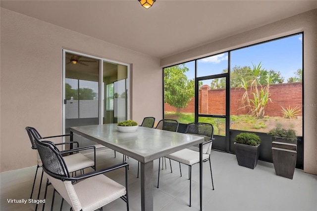 16780 Meadows St, Clermont, FL 34714 - sunroom with outdoor dining area and ceiling fan