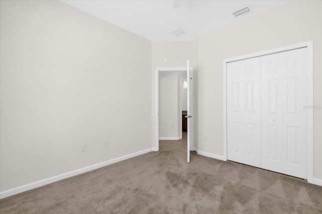 16780 Meadows St, Clermont, FL 34714 - unfurnished bedroom with carpet floors, a closet, and baseboards