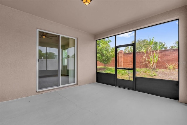 16780 Meadows St, Clermont, FL 34714 - unfurnished sunroom with ceiling fan