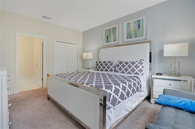 9034 Stinger Dr, Davenport, FL 33896 - carpeted bedroom with visible vents, baseboards, and a closet
