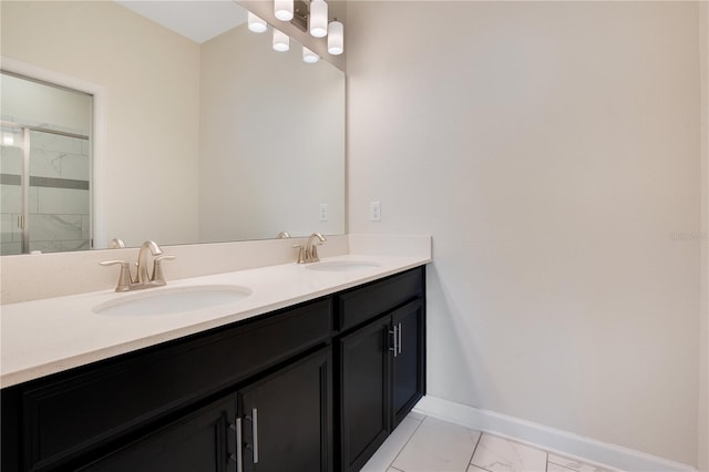 9034 Stinger Dr, Davenport, FL 33896 - bathroom with a sink, baseboards, double vanity, and marble finish floor