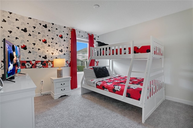 9034 Stinger Dr, Davenport, FL 33896 - carpeted bedroom featuring baseboards and an accent wall