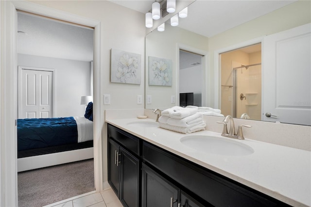 9034 Stinger Dr, Davenport, FL 33896 - full bath featuring connected bathroom, a sink, marble finish floor, and a stall shower