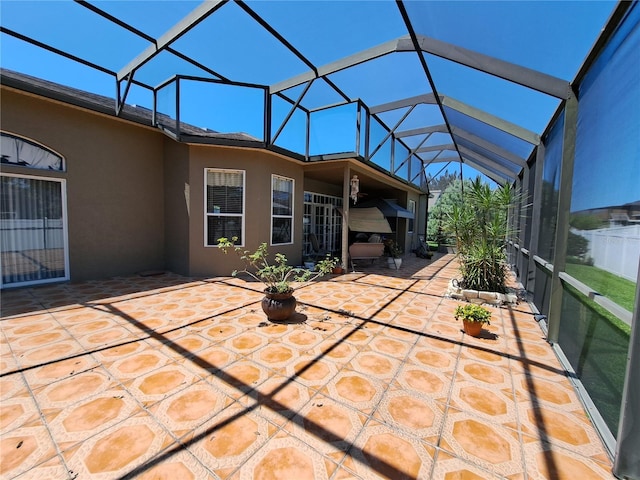 view of patio / terrace with glass enclosure