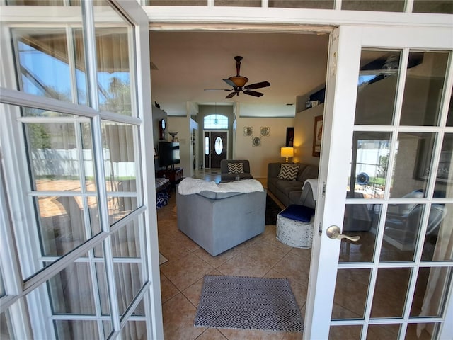 exterior space featuring a ceiling fan and french doors
