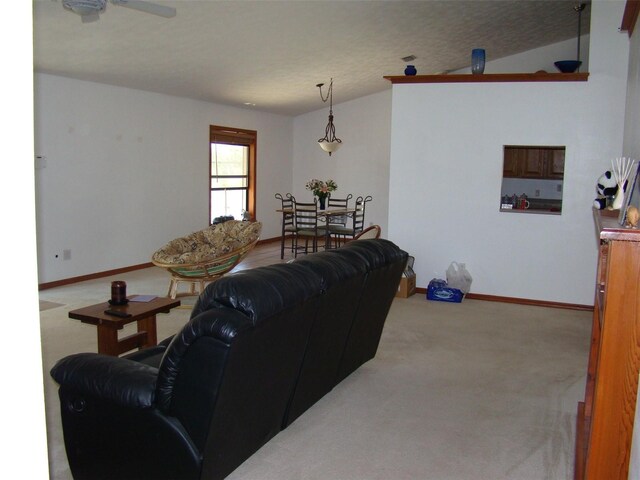 11624 Delmar Ave, Orlando, FL 32836 - living room with ceiling fan, carpet flooring, and baseboards