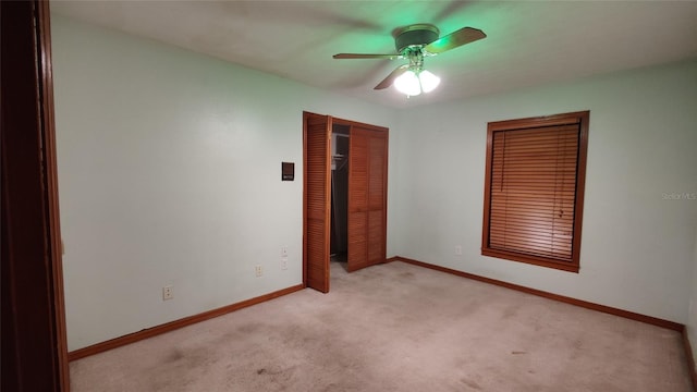 11624 Delmar Ave, Orlando, FL 32836 - unfurnished bedroom with light colored carpet, baseboards, a closet, and a ceiling fan
