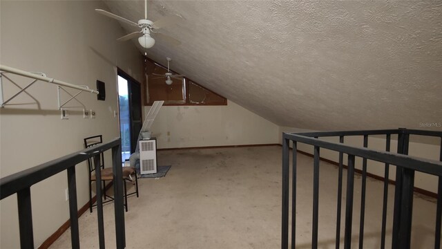 11624 Delmar Ave, Orlando, FL 32836 - additional living space featuring a ceiling fan, a textured ceiling, and lofted ceiling