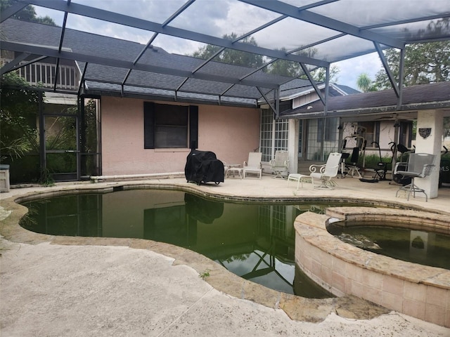 11624 Delmar Ave, Orlando, FL 32836 - view of pool with a patio area, a pool with connected hot tub, and glass enclosure