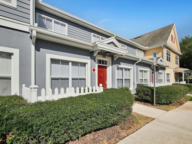 4560 Spigold Ct, Kissimmee, FL 34746 - view of property featuring stucco siding