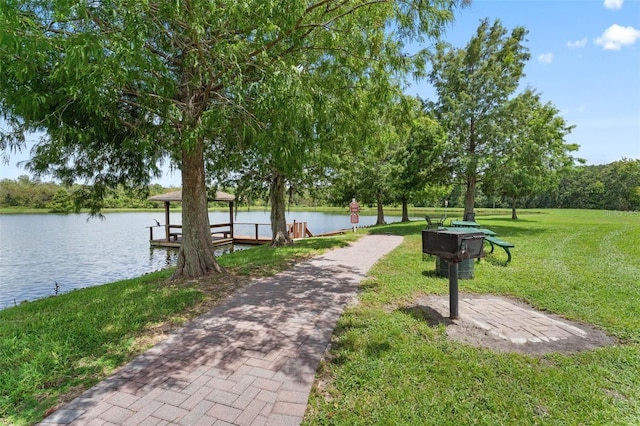 4560 Spigold Ct, Kissimmee, FL 34746 - view of community featuring a lawn, a water view, and a gazebo