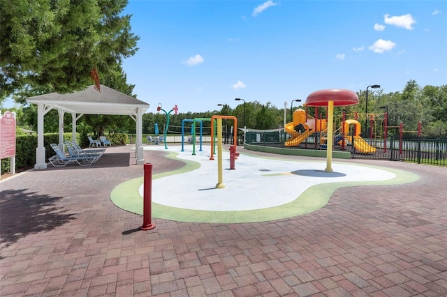 4560 Spigold Ct, Kissimmee, FL 34746 - communal playground featuring a gazebo and fence