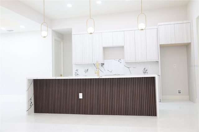 kitchen featuring backsplash, recessed lighting, and modern cabinets