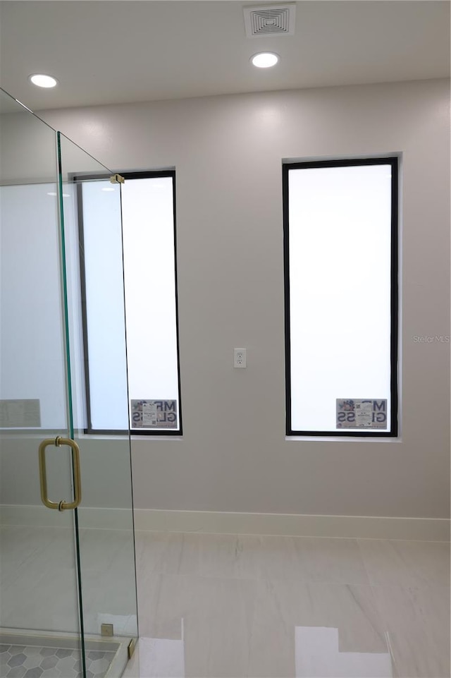 full bath featuring baseboards, a shower stall, recessed lighting, and visible vents