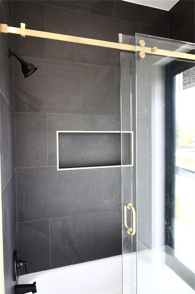 bathroom featuring a shower stall