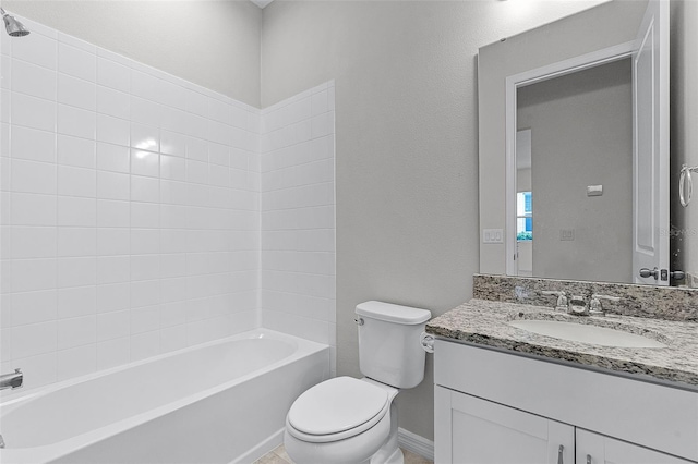 full bathroom featuring toilet, vanity,  shower combination, and baseboards
