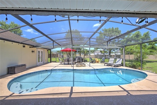 outdoor pool featuring french doors, a patio, fence, and a lanai