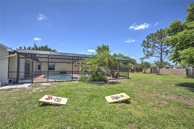 view of yard with an outdoor pool and a patio