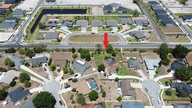 aerial view of property's location featuring nearby suburban area