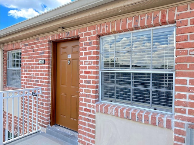 2426 Branch Way Unit 200, Maitland, FL 32751 - property entrance featuring brick siding