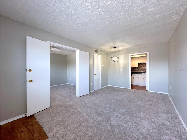 2426 Branch Way Unit 200, Maitland, FL 32751 - carpeted spare room with baseboards and a textured ceiling