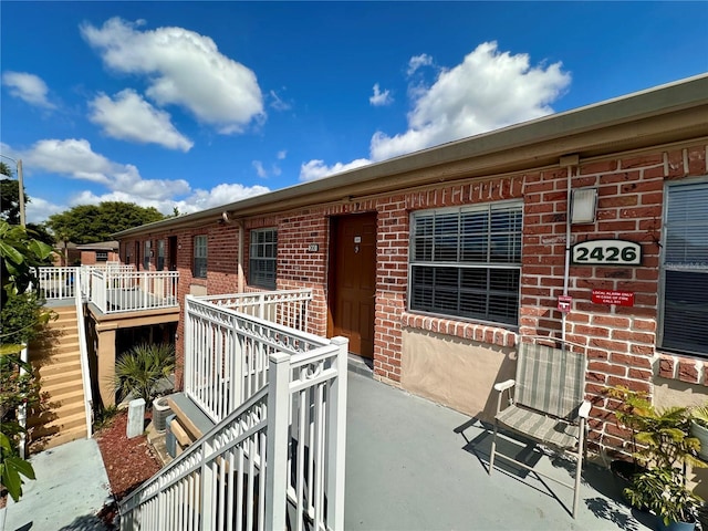 2426 Branch Way Unit 200, Maitland, FL 32751 - property entrance with brick siding