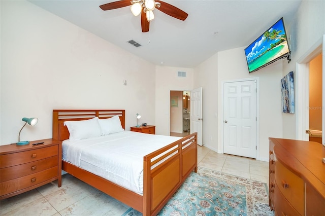bedroom featuring light tile patterned floors, a ceiling fan, and visible vents