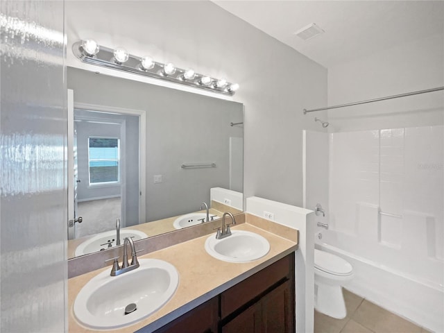 bathroom with a sink and tile patterned floors
