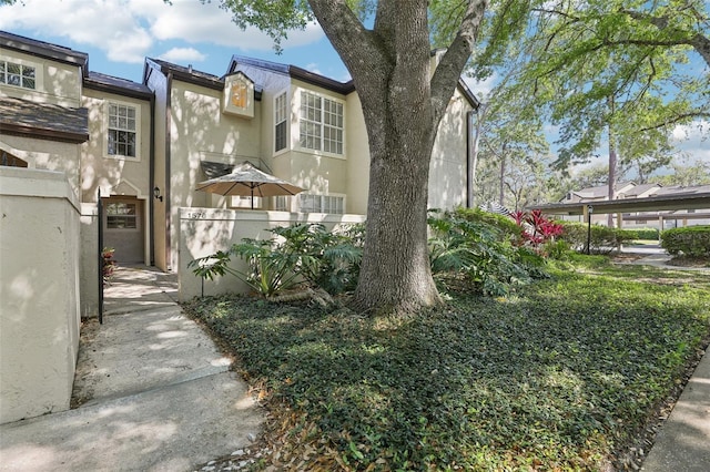 view of front of home featuring stucco siding